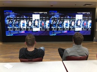 IU Kokomo Kelley Student Center IQ Wall with two students watching